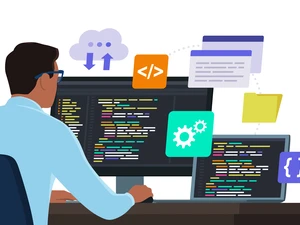 © iStock.com/elenabs
Quelle: iStock.com/elenabs Man sitting in front of a PC and coding